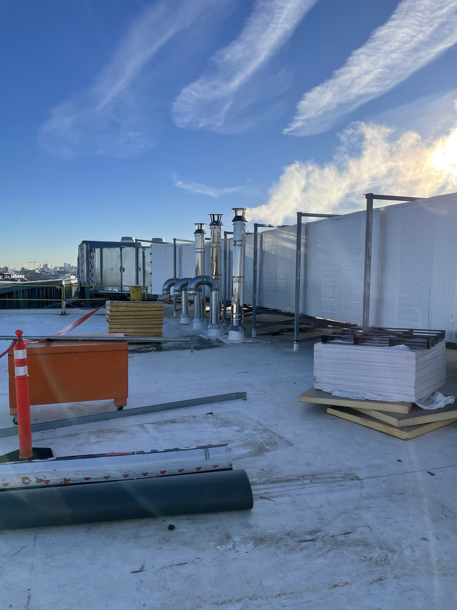 Ductwork installation at commercial project